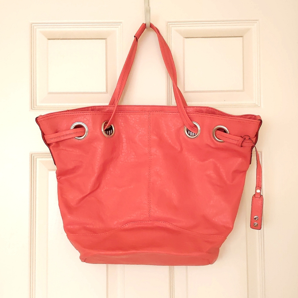 NWOT. Large simulated leather drawstring bucket bag.